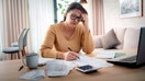 A woman working on her tax returns. - Fox Business News
