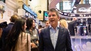 Travis Kalanick, founder and former chief executive officer of Uber Inc., center, stands on the trading floor during the company's initial public offering (IPO) at the New York Stock Exchange on May 10, 2019. - Fox Business News