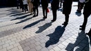 U.S. federal workers and other job seekers wait in line to enter a job fair event in Silver Spring, Maryland, on April 16, 2025. - Fox Business News