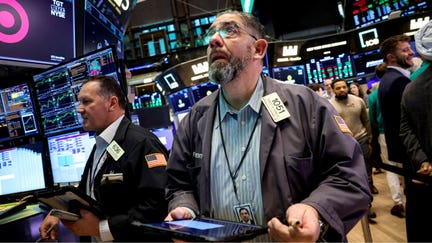 Traders work on the floor at the New York Stock Exchange in New York City, on March 3, 2026. - Fox Business News