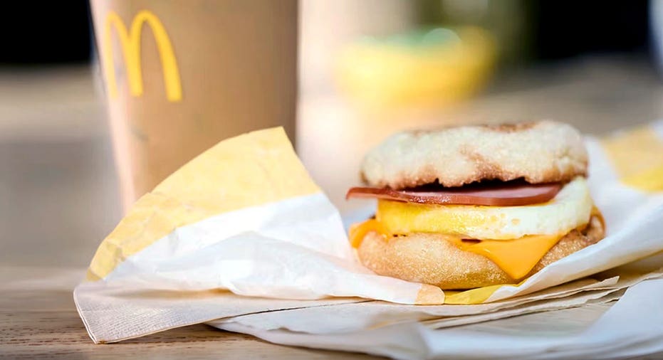 A McMuffin sandwich on a table.