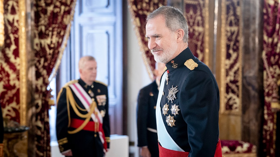 Spain’s King Felipe VI stands in a formal hall at the Royal Palace of Madrid during a credential ceremony with Bulgaria’s ambassador.