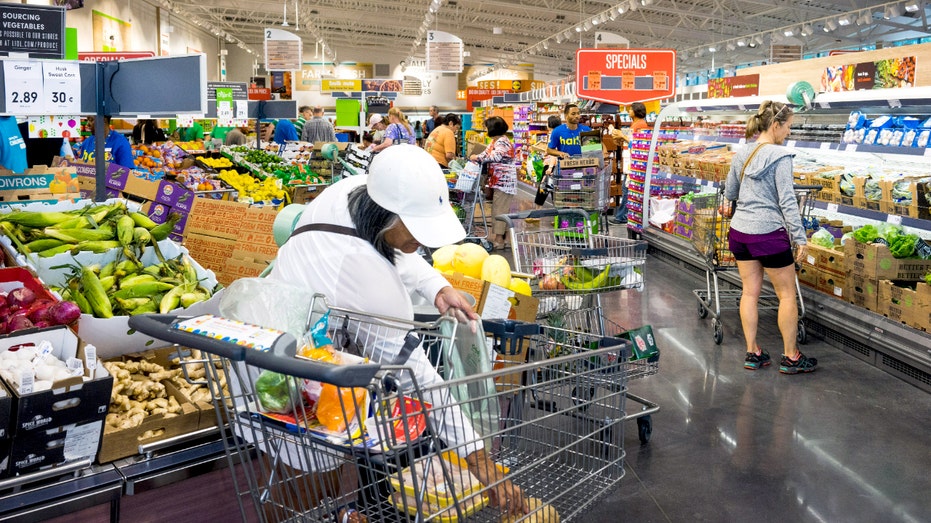 Shoppers inside a Lidl grocery store.