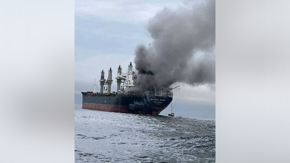 The Mayuree Naree cargo ship with black smoke
