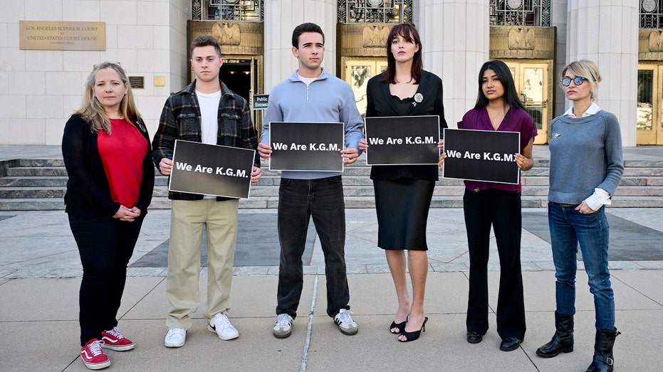 Supporters holding signs gather outside the Los Angeles Superior Court during a trial examining whether social media platforms were designed to be addictive to children.