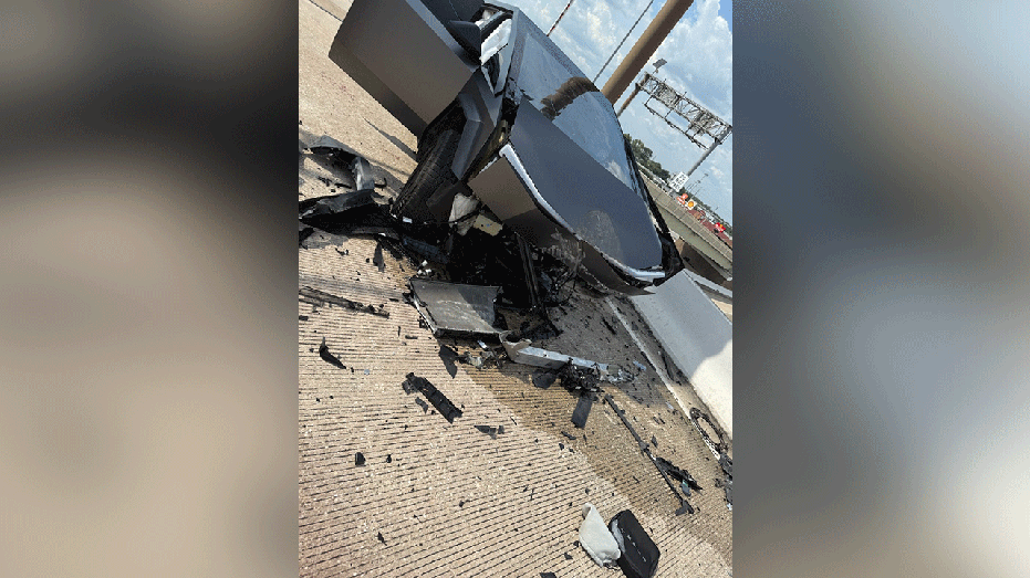 destroyed black cybertruck on highway
