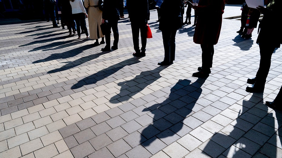 People stand in line