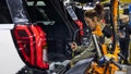 Worker assembles vehicle components on an auto production line at a Ford manufacturing plant. - Fox News