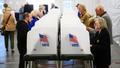 Voters making their selections at  voting booths inside an early voting site in the United States. - Fox News