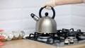 A stainless steel tea kettle on a stove. - Fox News