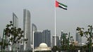 The United Arab Emirates flag flutters over Abu Dhabi.  - Fox Business News