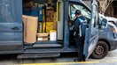 A worker near packages in an Amazon delivery vehicle in San Francisco, California, US, on Monday, Feb. 2, 2026.  - Fox Business News