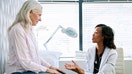 A doctor meets with a patient in her office. - Fox Business News