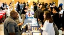 Jobseekers talk to recruiters during the New York Public Library's annual Bronx Job Fair & Expo at the Bronx Library Center in the Bronx borough of New York, US, on Friday, Sept. 6, 2024. US hiring fell short of forecasts in August after July's payroll number was revised down, a development likely to fuel ongoing debate over how much the Federal Reserve should cut interest rates.  - Fox Business News