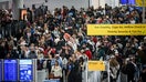 Travelers wait in line at a Transportation Security Administration (TSA) checkpoint at John F. Kennedy International Airport (JFK) in New York, US, on Friday, March 27, 2026. - Fox Business News