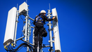 U.S. technician carries out repair work on an active 5G antenna. - Fox Business News