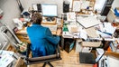 High Angle View Of Office Worker Working On Computer - Fox Business News