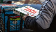 Papa John's box message telling customers to tip delivery drivers sparks fierce tipping culture debate online