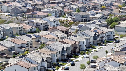 SANTA CLARITA, CALIFORNIA - APRIL 07: An aerial view shows homes in a housing development on April 7, 2026 in Santa Clarita, California. Before the war in Iran began, the average 30-year fixed home mortgage rate had fallen below 6 percent, but rates have since climbed back up to close to 6.5 percent. - Fox Business News