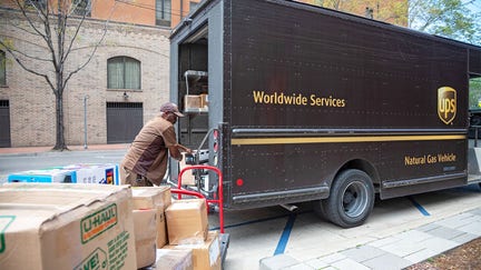 New Orleans, Louisiana, A United Parcel Service driver loads packages into his 'package car' at the New Orleans Convention Center.  - Fox Business News