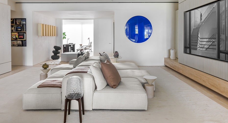 Luxury condo lounging area with couches