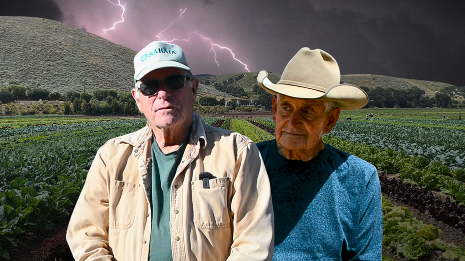 California farmers with storm in background