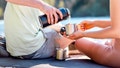A man pours liquid out of a Thermos-like container. - Fox News