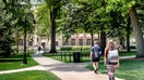 Students walk across the campus of Penn State University in University Park, Pennsylvania. - Fox Business News