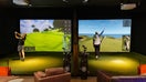 Golfers play a simulated round at a Five Iron location. - Fox Business News
