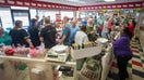 Customers wait in line to buys candy at Lammes Candies on Airport Boulevard in Austin on Monday, April 27, 2026, following the company's announcement that it is winding down operations after 141 years in business. - Fox Business News