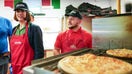 Rachel Reeves, Labour&rsquo;s Shadow Chancellor of the Exchequer, is given a tour of the Papa Johns restaurant during a visit to Primrose Valley Holiday Park on July 25, 2023 in Filey, England.  - Fox Business News