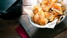 Homemade potato chips are seen in a basket. - Fox Business News