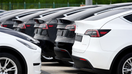 Tesla Model Y and Model 3 electric vehicles wait to be loaded on board a roll-on-roll-off cargo vessel - Fox Business News