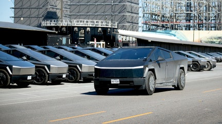 A fleet of Tesla Cybertrucks sits outside the Starbase Build Site at SpaceX's South Texas testing facility on Feb. 6, 2026. - Fox Business News