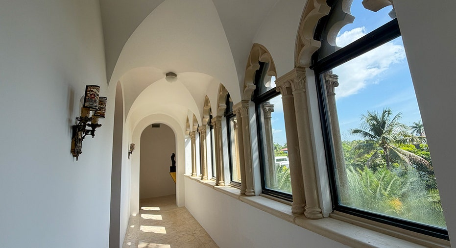 Long hallway with gothic fixtures