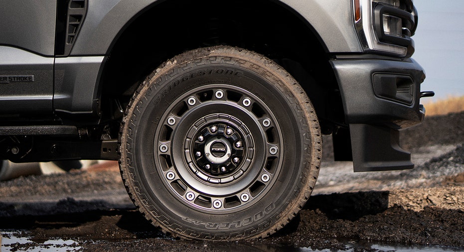 A close-up of the wheel and tire on the Ford Super Duty Carhartt edition truck