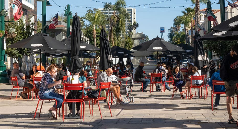 People sit at tables in San Diego's Little Italy