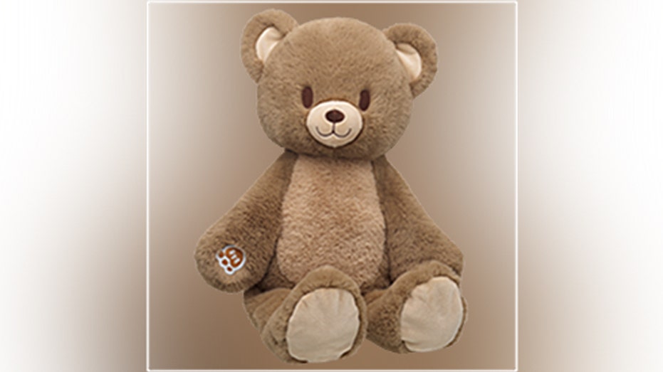 A close-up of a Build-A-Bear plush bear