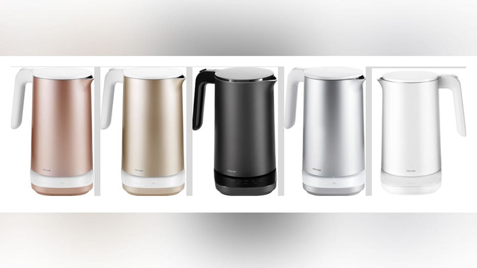 Various colored electric kettles lined up