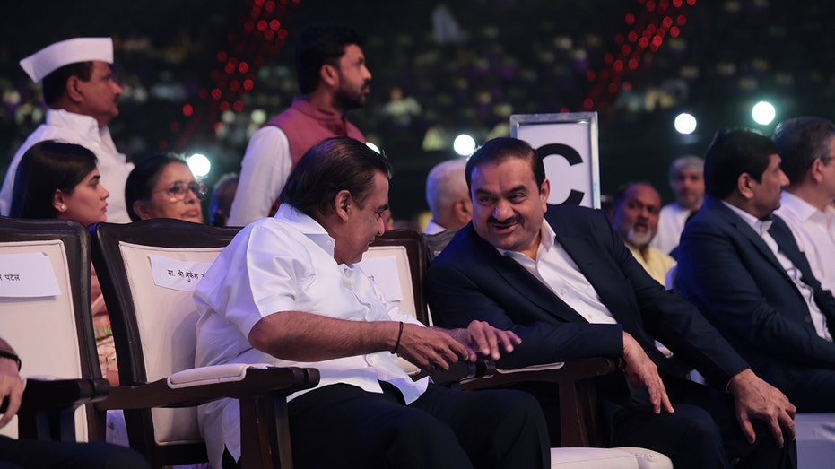 Gautam Adani having conversation during an all-party prayer meeting