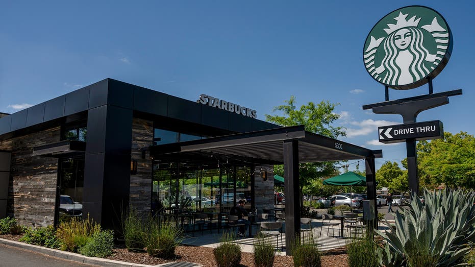Starbucks sign outside of coffee shop
