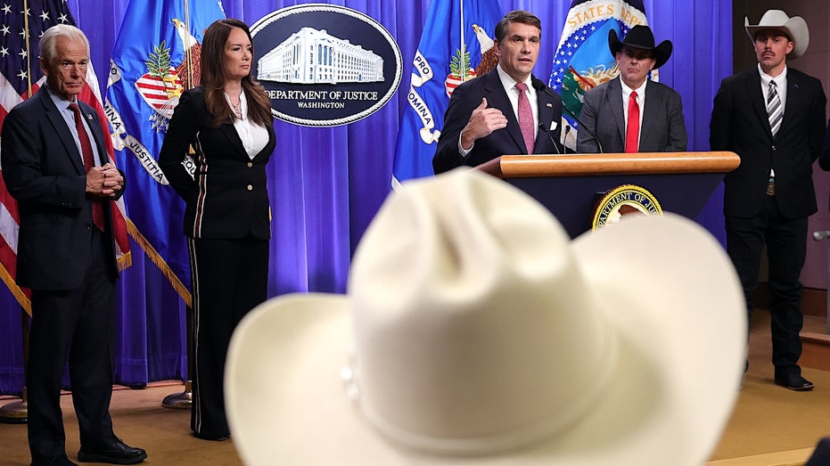 white house and justice department officials at a news conference