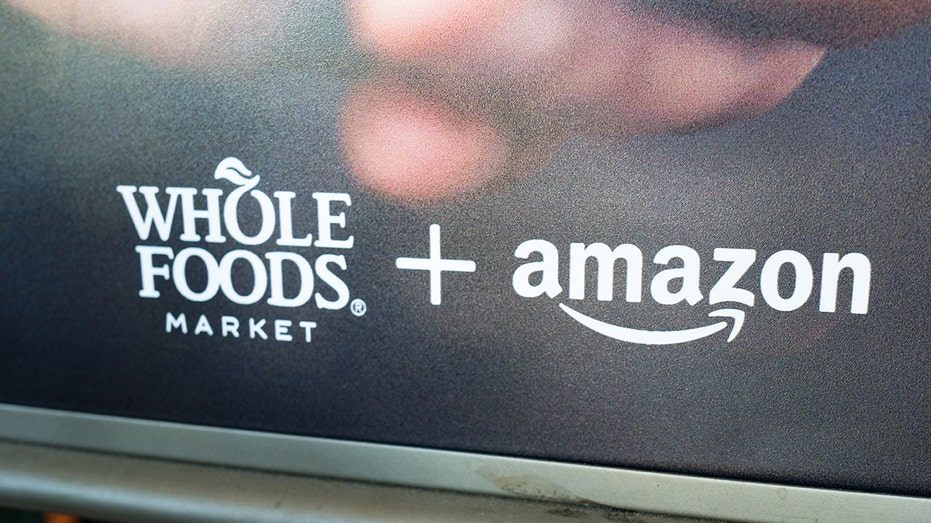 whole foods and amazon sign