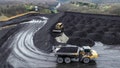 Workers transport and organize mounds of coal on a hilltop near an Arch Coal facility in Beckley, West Virginia, U.S., April 11, 2025. - Fox News
