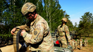 U.S. Army soldier handling caliber cartridges. - Fox Business News