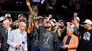 Jalen Brunson of the New York Knicks lifts the Bill Russell NBA Finals Most Valuable Player Award trophy after defeating the San Antonio Spurs in Game Five of the 2026 NBA Finals at Frost Bank Center on June 13, 2026 in San Antonio, Texas.  - Fox Business News