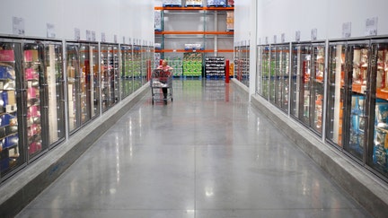 A customer pushes a shopping cart through the frozen foods section at a Costco Wholesale Corp. store in Louisville, Kentucky, U.S., on Wednesday, May 29, 2019. - Fox Business News