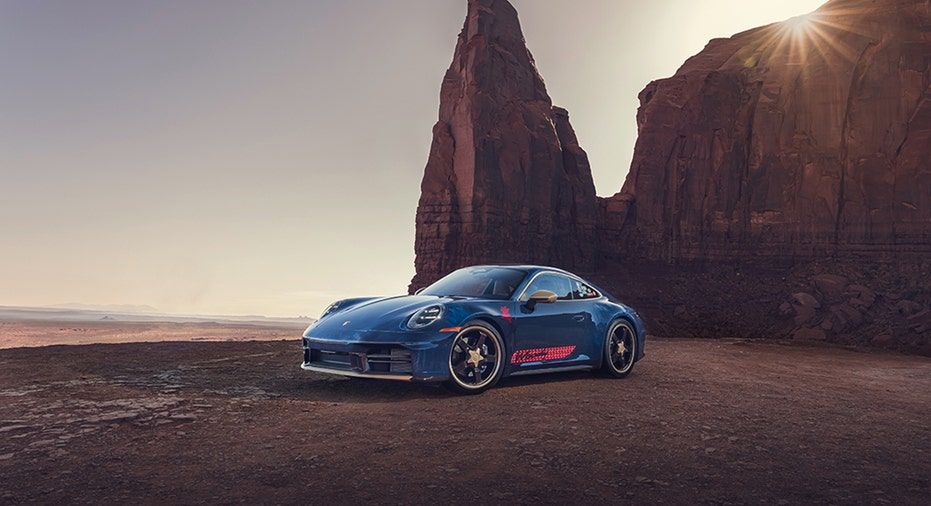 A Woody-inspired Porsche 911 Carrera T channels the cowboy dollÃ¢ÂÂs worn-in charm with denim-textured paint and western-themed design cues for Disney and PixarÃ¢ÂÂs 