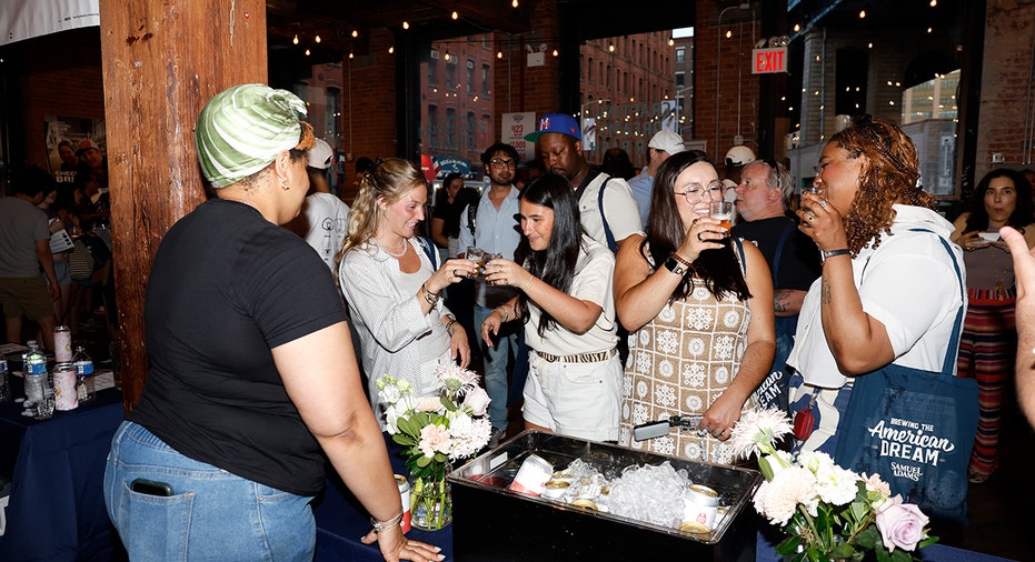 Guests sample beers during Samuel Adams’ Crafting Dreams Beer Bash in Brooklyn, New York, on June 11, 2026.