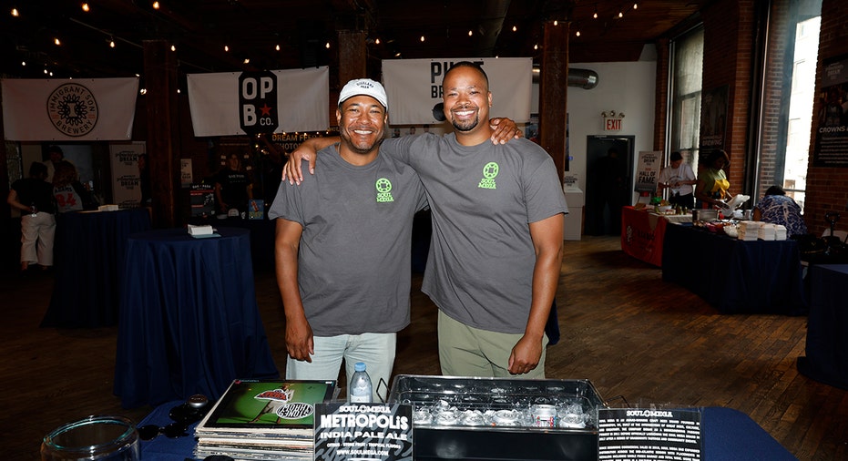 Soul Mega team members pose at the brewery’s table during Samuel Adams’ Crafting Dreams Beer Bash in Brooklyn, N.Y., June 11, 2026.